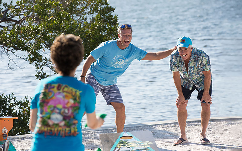 Jimmy Buffett and friends enjoying the pool and other amenities